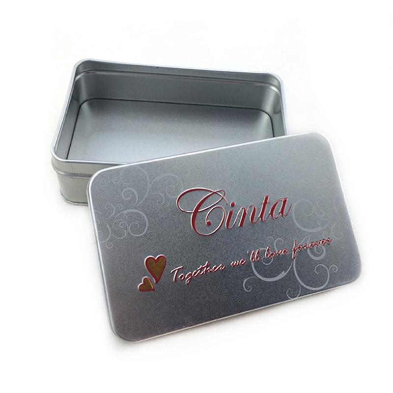 Caja de lata cosmética rectangular de barniz plateado personalizado con logotipo en relieve